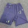 Couleur de shorts pour hommes Couleur Couleur d'encre Graffiti peint à la main et Capris sportif féminin