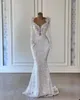 Abiti a sirena 2023 Abito da sposa da sposa Cristalli con perline Applique in pizzo Scollo a V con maniche lunghe Abiti su misura Abiti da sposa Taglie forti