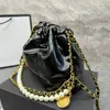 Designer Femmes Hobo Bucket Sac à provisions de seau Luxury Chanelsness C Pearls Chain Trawstring Tote Hands Sacs Lady Oil Wax Leather Mini Cossbody Sacs