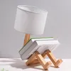 Lâmpadas de mesa Modern LED Robot forma de madeira Luz nórdica para a sala de estar flexível de mesa de mesa infantil luminária de cama de cama