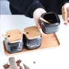 Bottiglie di stoccaggio Set di serbatoi per condimenti da cucina in ceramica con motivo in marmo in stile nordico creativo, copertura in legno, accessori per barattoli di spezie, saliera