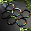 Braccialetti con ciondoli Braccialetti con ciondoli Fatti a mano 7 Chakra Bracciale curativo Catena elastica in cristallo Yoga Meditazione Reiki Preghiera Perline Pietre Nc Dh3Em