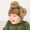 قبعة قبعة قبعة Sprint Winter Bow Bonnet Baby Girls Cute Hairbow Skullcap Fontanelle Protect