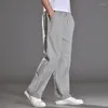 Pantaloni da uomo sottili in lino sciolto moda pantaloni oversize da uomo in cotone traspirante e pantaloni