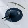 Boinas Hollow Hook Flower Sombrero de paja Francés Elegante Anti-ultravioleta Playa Ocio Ropa de compras al aire libre Mujer Azul Verano