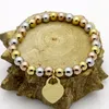 Braccialetti con ciondoli gioielli bracciale in oro bracciale in acciaio inossidabile 316L di lusso con catena di perline a forma di cuore da donna perline alla moda rotonde designer lady regalo di San Valentino