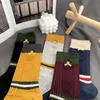 Lange sokken dames ins in modieus all-match borduurwerk eenvoudige middelste buis katoenen sok dubbele naald verdikt warme high-top luxe bunkingssokken