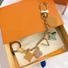 Fashion Key Holder Keychain Car Luxurys Designers Keychain Car Key Fashion Flower Keyring Bag Charm Lovers Gift 2211103Z