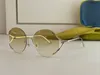 Nowe okulary przeciwsłoneczne projektowania mody 0645S okrągłe krawędzi popularne i proste styl wszechstronne okulary Uv400 Ochronia
