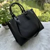 Sacs à main de luxe de luxe Sac à main en cuir Saffiano moyen Sac monochrome wmen Double Top Totes avec motif assorti en cuir de veau Sac à main de haute qualité