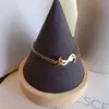 Nuovi braccialetti di stile Braccialetto da donna Gioielli di design di lusso Placcato oro 18 carati Acciaio inossidabile Amanti di nozze Regalo Braccialetti a catena con polsino