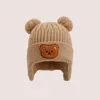 Berets Winter Kids Warflap Bomber Hat с помпонами мультфильм Bear Beanie Pilot Защита ушей мальчики девочки 6-48 месяцев сохранить теплую кепку