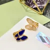 Boucles d'oreilles Stud Copper Gold Bijoux exquis Exquis Simple Metallic Lapis Lazuli Diamond Double papillon