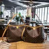 Mujeres clásicas Bolsos de diseñador de lujo Bolso de mano Bolsos de compras Monederos Mujeres Pu Cuero Francia Marca Carta Bolsos de hombro Bolso bandolera para mujeres 42 cm