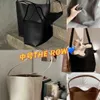 Designers väskor kvinnor Luxurys The Row Tote Crossbody Leather Bucket Half Moon Bag Crescent Underarm Shoulder Purse Gatk