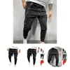 Pantalon masculin Soft Sports Compress Joggers Leggings Men Fitness Pockets lâches pour extérieur