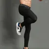 Мужские брюки мужчины, управляющие черным леггинговым фитнесом Тренировки Slim Sport