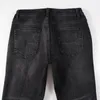 Jean en denim stretch multi-patchs noir pour homme usé trou coupe slim jambe