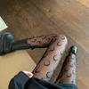 Femmes chaussettes Sexy dentelle collants Leggings Lolita évidé maille bas Long Floral rotin noir collants bas bonneterie