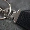 유명한 BrandcherryDesigner Unisex Black Key Chain 액세서리 P 키 체인 편지 고급 패턴 자동차 키 체인 보석 선물 열쇠 가방을위한 끈