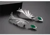 أقراط ظهورها 2022 Ins Green Zircon Ear Cuf Clips Hight Women's Home Gight Jewelry Feather Clip Clip Eponring Accessorie