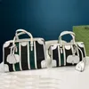 旅行トートバッグの女性ハンドバッグデザイナー高級クロスボディショルダーバッグファッションショップバッグ財布キャンバス本革のクラシックレターハードウェアストライプベルト715772