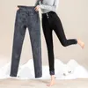 Jeans invernali a 4 colori Pantaloni in denim caldo e spesso in pile di velluto da donna Pantaloni a vita alta in jeans skinny vintage a gamba larga