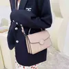 Simple couture portable petit sac femmes 2022 nouveau banlieue fronde un sac à bandoulière sac à bandoulière
