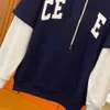 Ce 22s sweat à capuche designer sportswear automne et hiver épissage faux deux hommes et femmes en vrac sweat-shirt en coton pull polyvalent manteau tendance en vrac chemise à manches longues