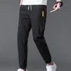 Pantalons pour hommes Glace Soie Casual Sports D'été Mince Cordon Élastique Taille Neuf Points À Séchage Rapide À La Mode Slim Pantalon Hommes 221111