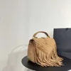 Designer de luxe pour femmes Sac à bandoulière unique Fourre-tout Pompon Messenger Vintage Style d'épaule unique Grand volume Sac Ventes directes d'usine