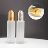 100 pièces 30 ml vide clair/verre givré huile essentielle bouteille de parfum avec pompe à pression flacon compte-gouttes