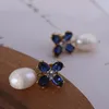 Boucles d'oreilles à tige Style européen et américain Tempérament élégant Forme de fleur bleue Perle de cristal incrustée