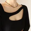 Collier ras du cou en corde noire pour femmes, tendance, personnalité de la mode, néo-gothique, tournant, perles de couleur or, chaîne de clavicule, 2022