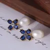 Boucles d'oreilles à tige Style européen et américain Tempérament élégant Forme de fleur bleue Perle de cristal incrustée