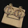 2021 Nuovo marca di moda Orenatura color diamante doppia g lettera in ottone Personalit￠ Orecchini donne designer di matrimoni Designer gioielli di alta qualit￠ con scatola