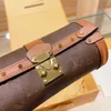 Akşam torbaları silindir paketi yuvarlak omuz çantası retro crossbody çantalar klasik üçgen toka çıkarılabilir kemer zinciri harf deseni