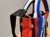 新しい女性のショルダーバッグデザイナータオル刺繍ストライプデザインハンドバッグ