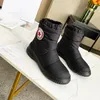 Designer Boots Paris Luxury Brand Boot äkta läder Varma stövlar Martin Ankle Booties Man kort vinter full päls fluffy päls sneakers tränare av varumärke W210 03