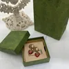 Pendientes de diseñadores de lujo pendientes de personalidad de temperamento de semental de fresa pendientes de sentido retro moda dulce encantador muy agradable