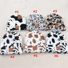 Berretti firmati Moda Lettera Cappelli lavorati a maglia Bambini Genitore-figlio Leopardo Mucca stampata Cappellini con teschio Cappellino invernale PU Etichetta Cappello all'uncinetto Berretto a maglia Natale