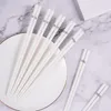 Ensembles de vaisselle 10 baguettes en céramique Paris simples, vaisselle antidérapante en porcelaine blanche pure à bords dorés