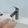 Grifos de lavabo de baño Pistola Gris Lavabo de cobre fino y grifo frío Carrete de cerámica