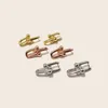 Dingla örhängen Hårdvaruelement Länkdesign Kvinnor högkvalitativ lyx titanstål Guldfärg Mode örhängen smycken