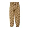 Designer Mens Jacquard broek vrouwen klassieke volledige letter broek losse vrijetijds buiten beweging high street harem broek mode man joggers rennen