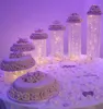 お祝い用品6pcs/set/lot clear Acrylic Crystal Cakeスタンドは、結婚式のホームパーティーのための6つの異なる背の高いビーズストランドを備えています