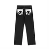 Męskie dżinsy 2021 Nowy przylot kreskówek kieszonkowy Retro myjni mężczyźni Hip Hop dżinsy spodnie Proste swobodny ludowe spodnie dżinsowe Pantn Homme T221102