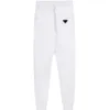 Pantaloni sportivi con marchio Fashion 23SS per maschili jogger per pantaloni della tuta con badge di alta qualit￠ da pista da uomo pantaloni lunghi pantaloni lunghi pantaloni lunghi