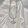 Iced Out Bling 5A Sparking CZ Cubic Zirconia Lucky Evil Eye Pendant Halsband Kvinnor Tennis Chain Pärled Chain Jewelry 201013228553050