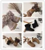 2023キャットウォークスタイルの雪のブーツファッションuggitys big bowknot design medium bootes for luxury brand ugglie冬の暖かい靴wggsウールブーツ